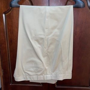 IZOD men’s American Chino double pleated pants. 46Wx 42L. Tan color Price $29.00